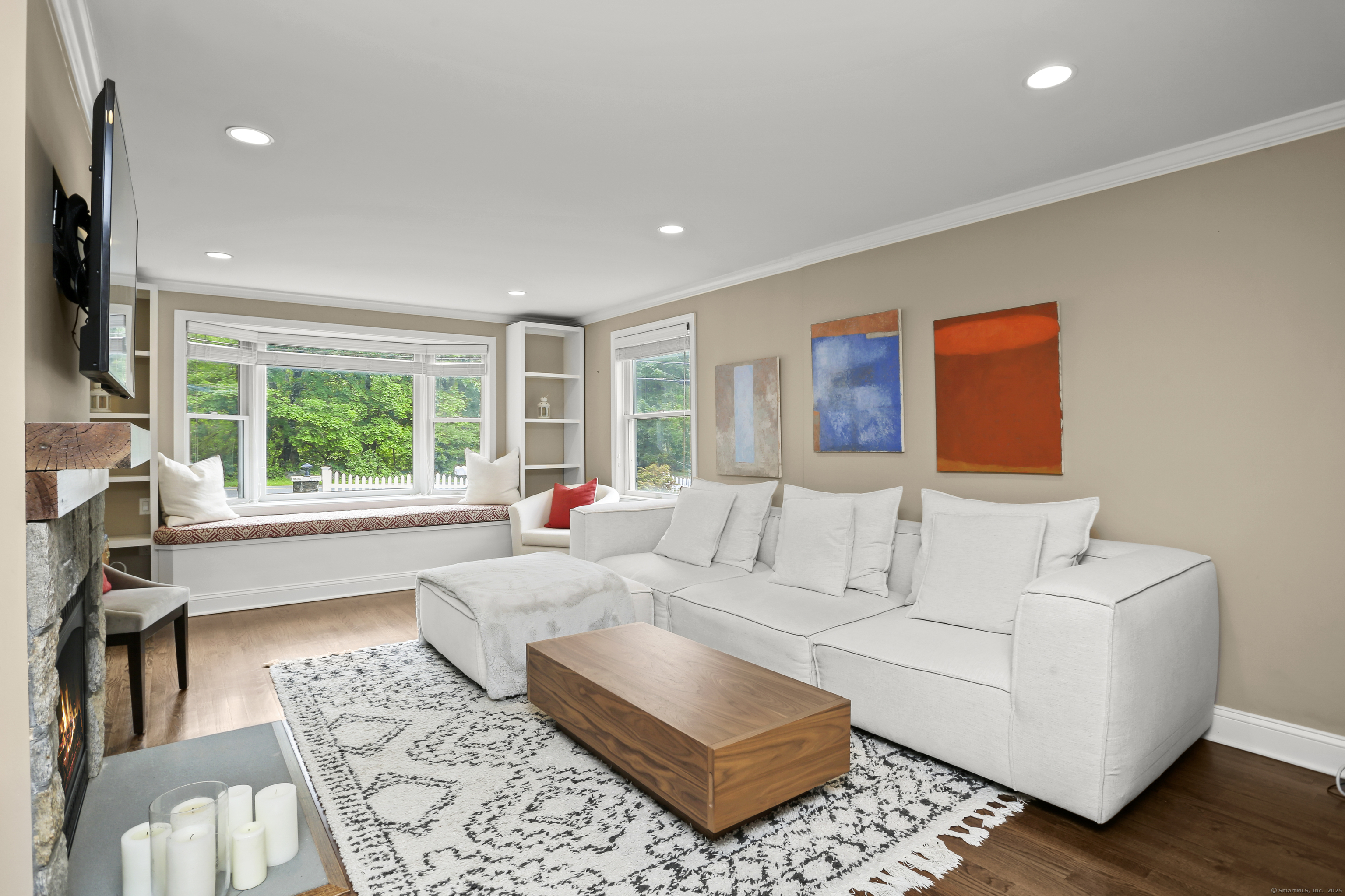 110 Weaver Street, Unit B Greenwich, CT 06831 - Photo 8 of 19 a living room with furniture and a window