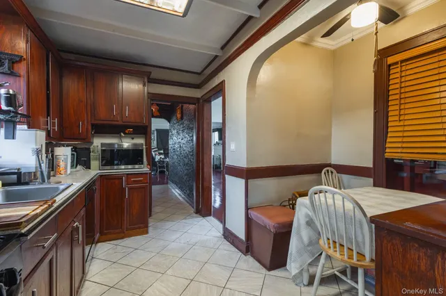 a kitchen with stainless steel appliances granite countertop a sink and cabinets