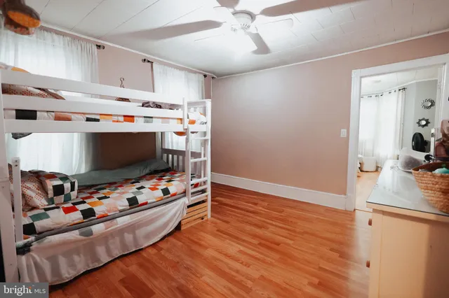 a room with furniture and flat screen tv