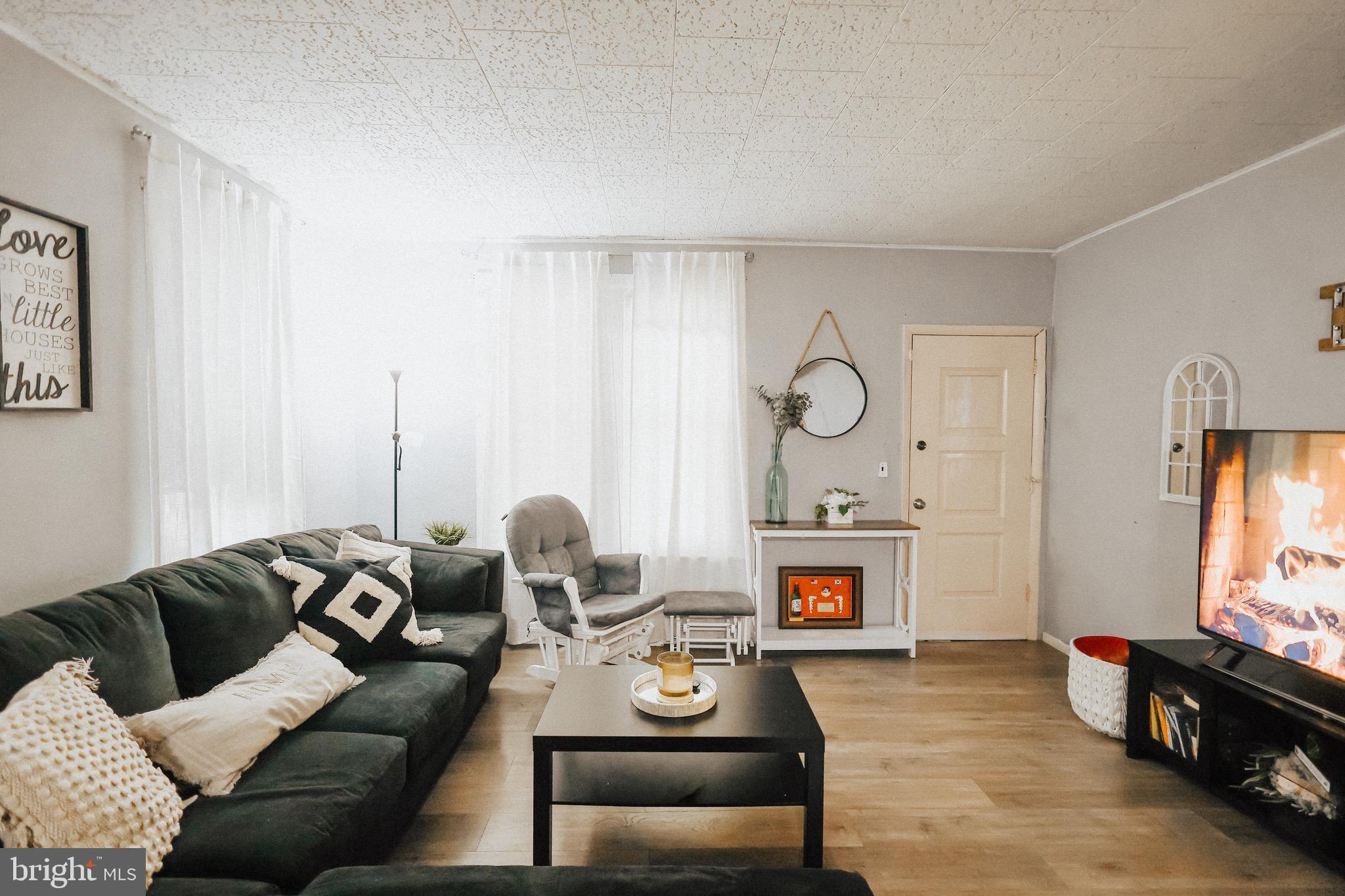 11 Seminary Avenue Reading, PA 19605 - Photo 8 of 15 a living room with furniture fireplace and flat screen tv