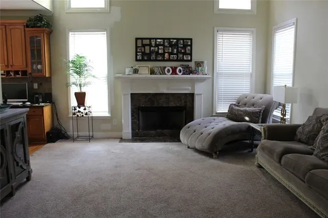 a bathroom with a sink a mirror and a shower