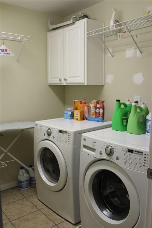 3411 Jim Moore Road Dacula, GA 30019 - Photo 35 of 54 a utility room with dryer and washer