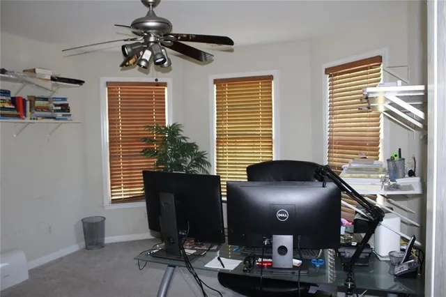 a bedroom with a bed and a table