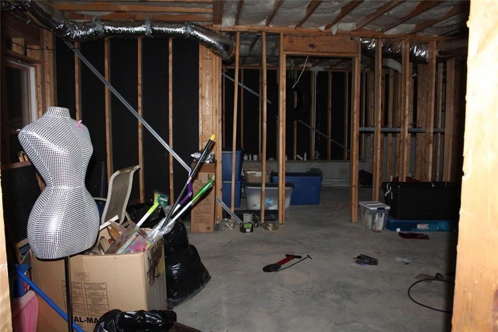 3411 Jim Moore Road Dacula, GA 30019 - Photo 52 of 54 a view of a room with gym equipment