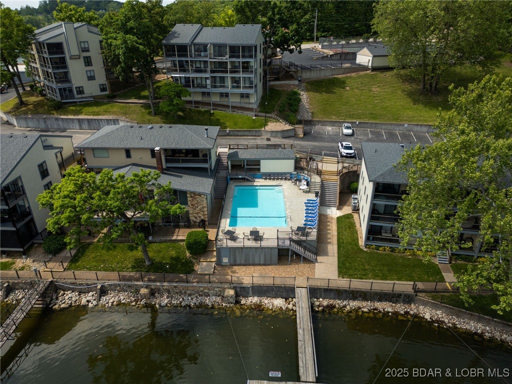 80 Willow Ridge Road, Unit 3A Lake Ozark, MO 65049 - Photo 35 of 37 Pool and tennis courts, rounding out
the lifestyl