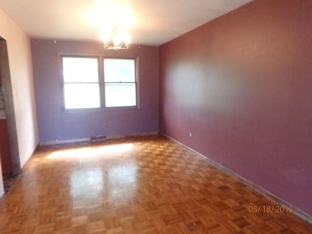 557 Old Meadow Road Matteson, IL 60443 - Photo 13 of 16 an empty room with a window