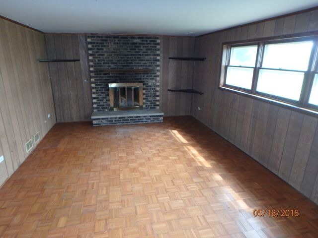 557 Old Meadow Road Matteson, IL 60443 - Photo 6 of 16 an empty room with windows
