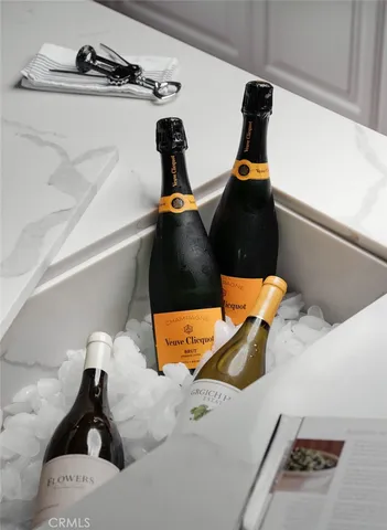 a spacious bathroom with a double vanity sink and a mirror