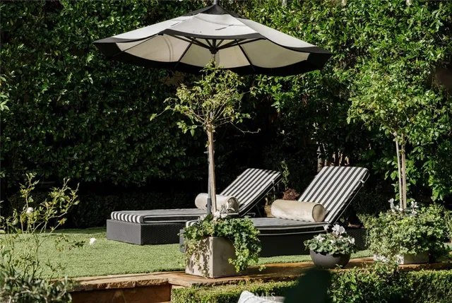 a utility room with cabinets washer and dryer