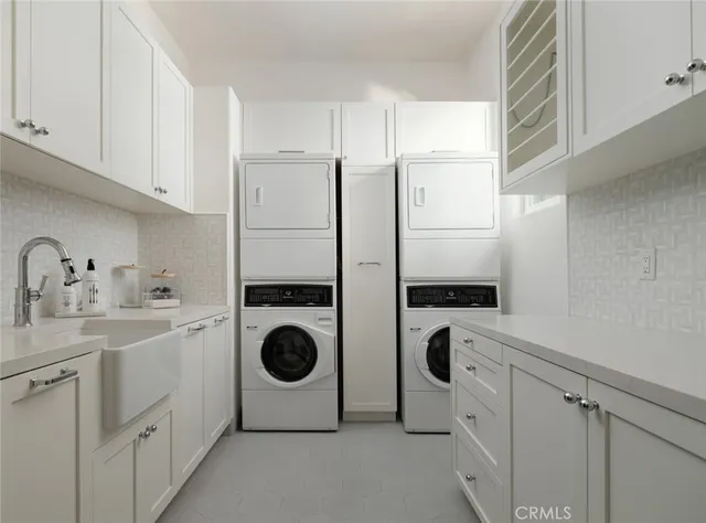 a spacious bedroom with a bed and a couch