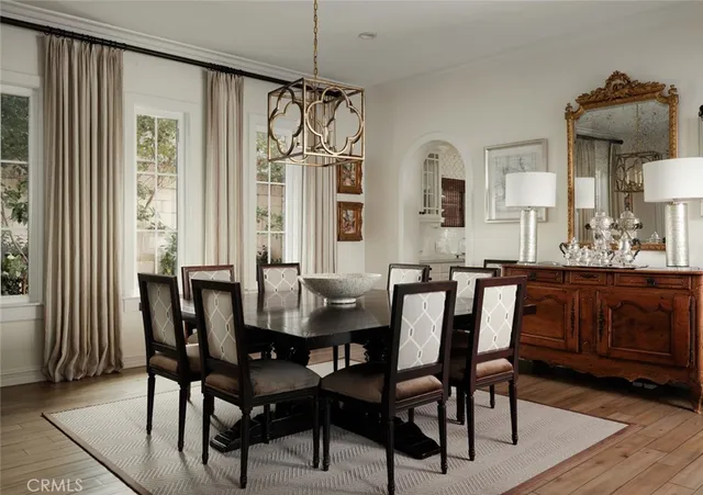 a view of a dining room with furniture and window