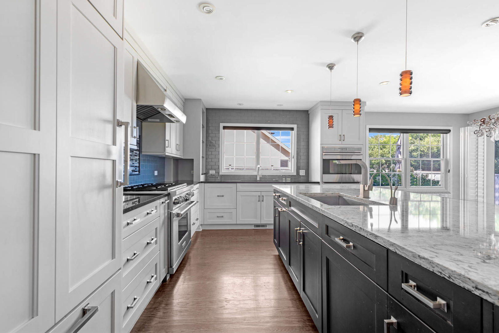 86 South River Road Naperville, IL 60540 - Photo 13 of 34 a kitchen with granite countertop lots of counter top space and stainless steel appliances