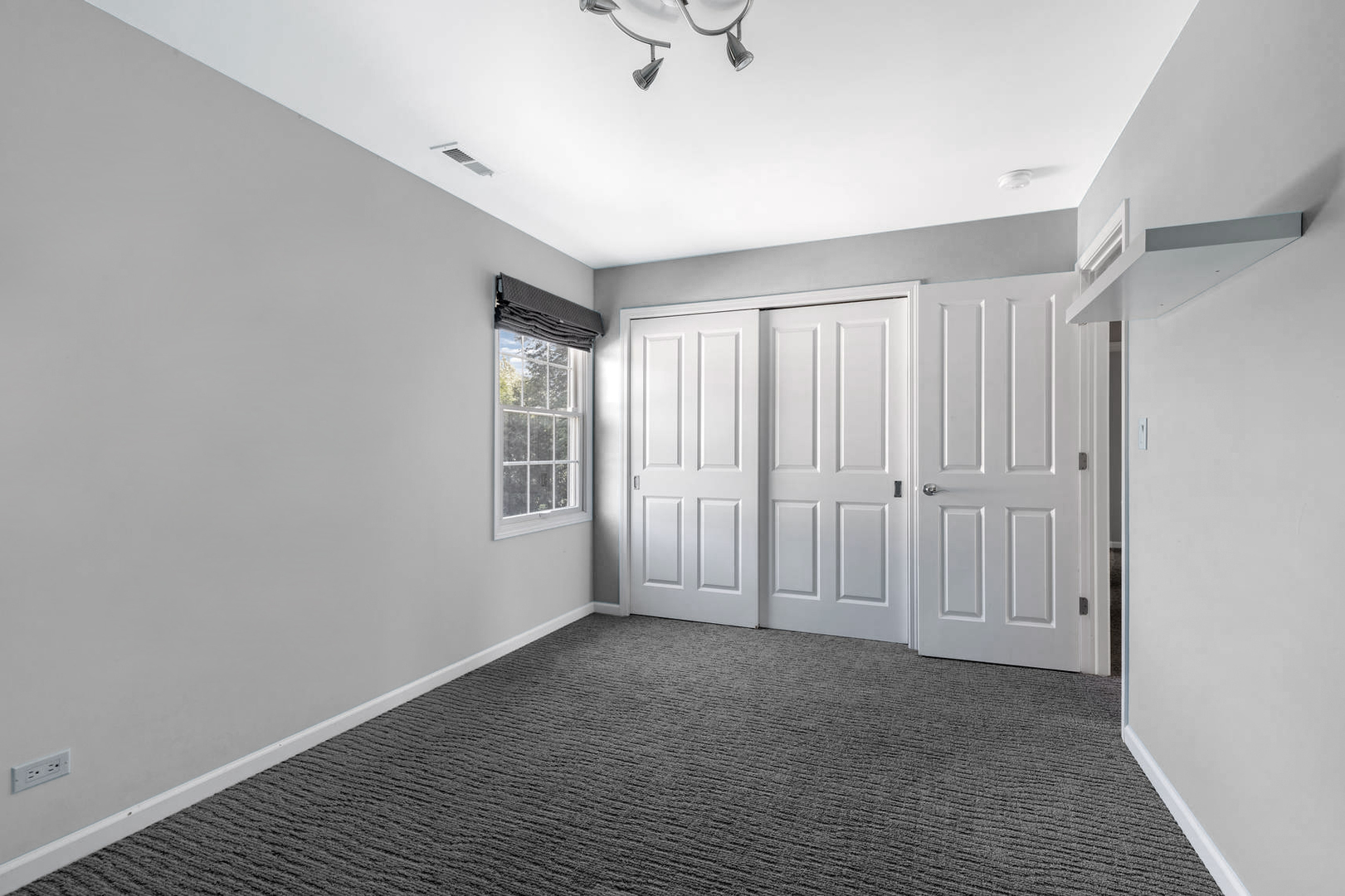 86 South River Road Naperville, IL 60540 - Photo 23 of 34 a view of an empty room with a window