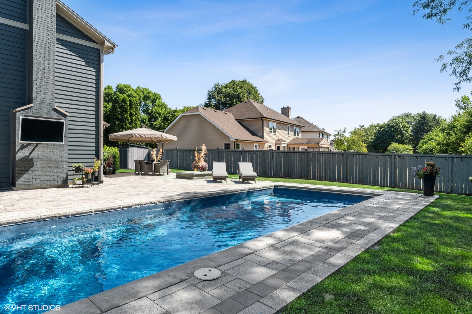 86 South River Road Naperville, IL 60540 - Photo 9 of 34 a view of a house with backyard and sitting area