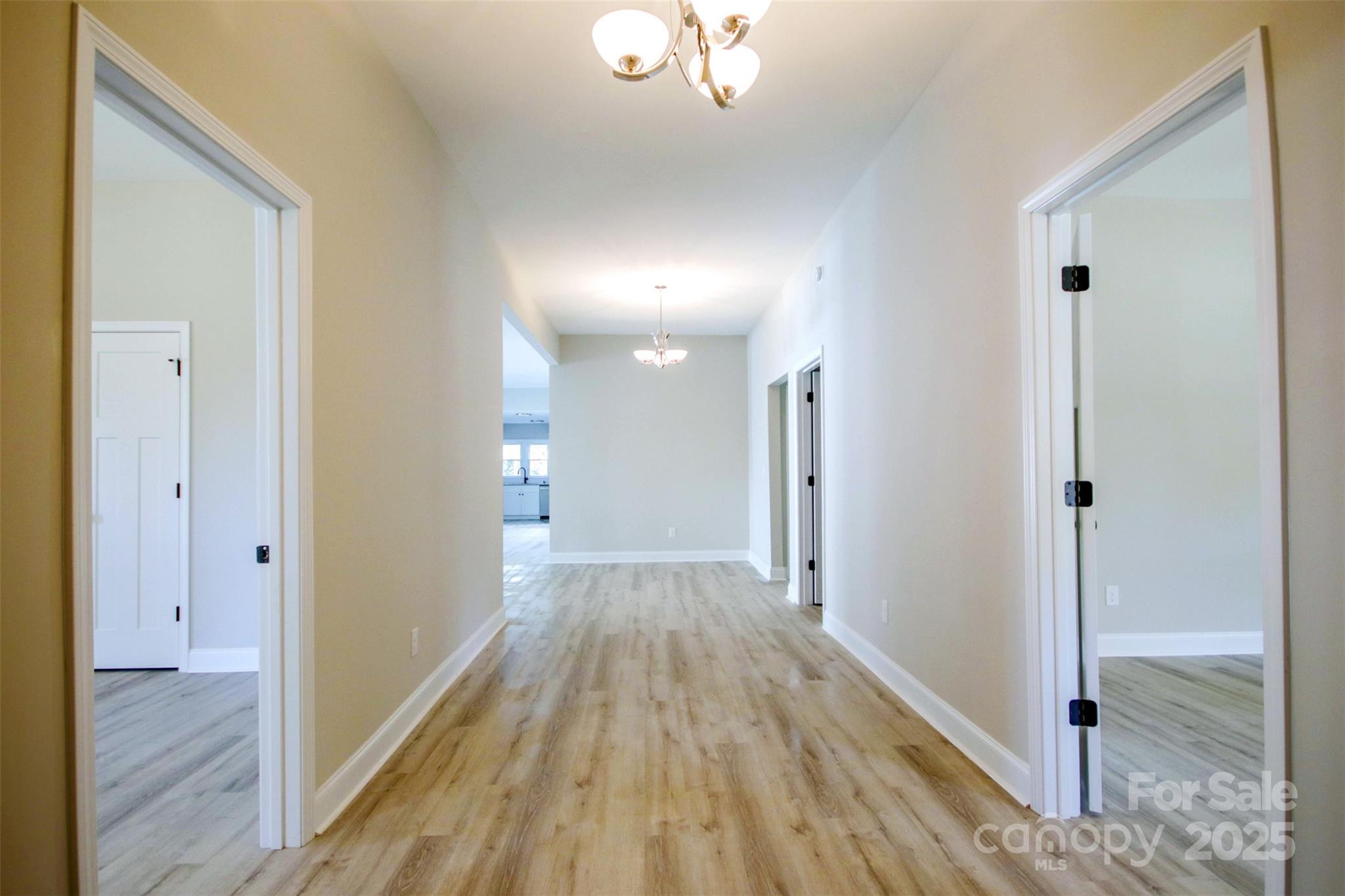 119 Marion Street Clover, SC 29710 - Photo 12 of 45 a view of a hallway with wooden floor