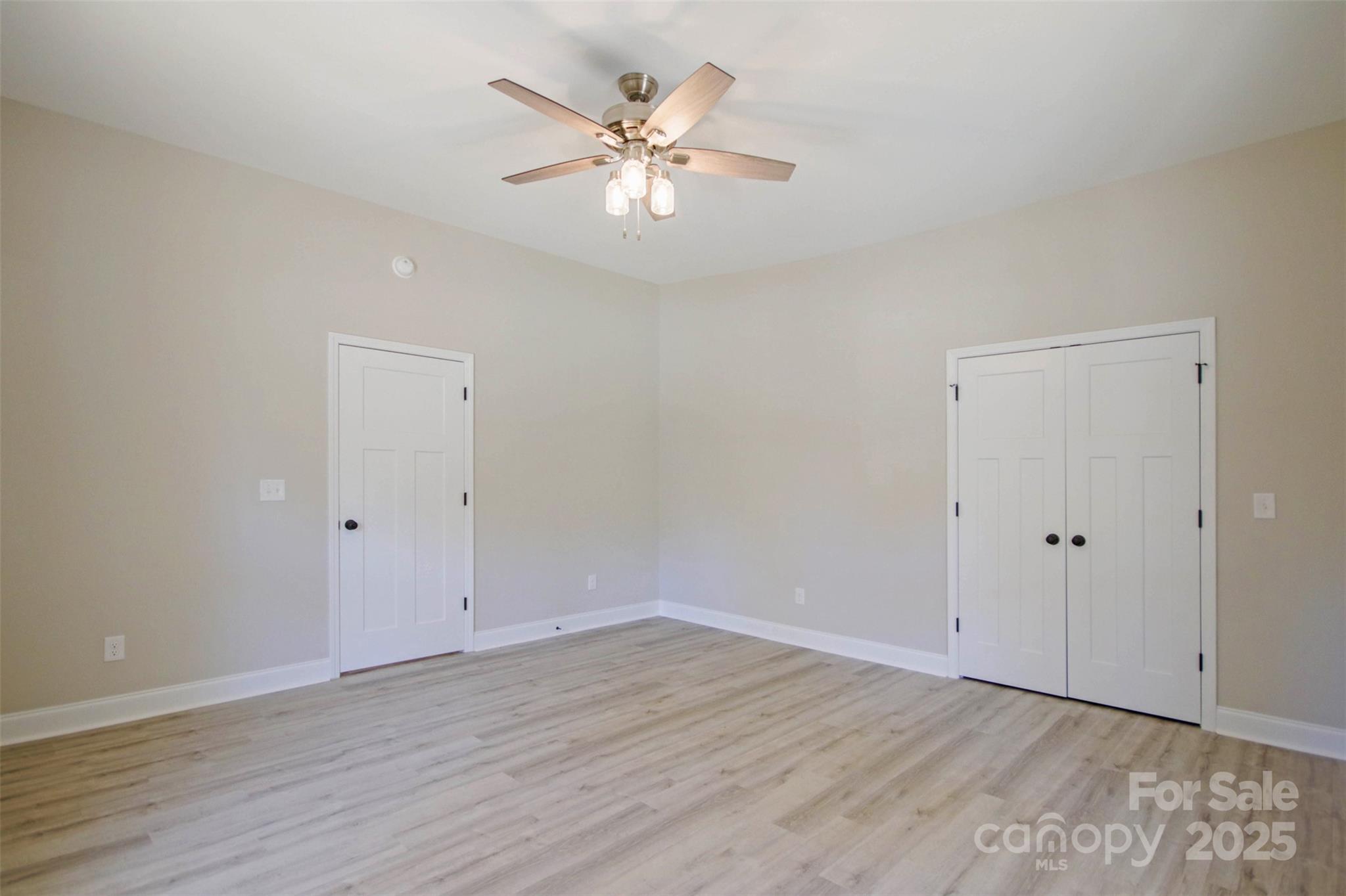 119 Marion Street Clover, SC 29710 - Photo 20 of 45 a view of an empty room with wooden floor
