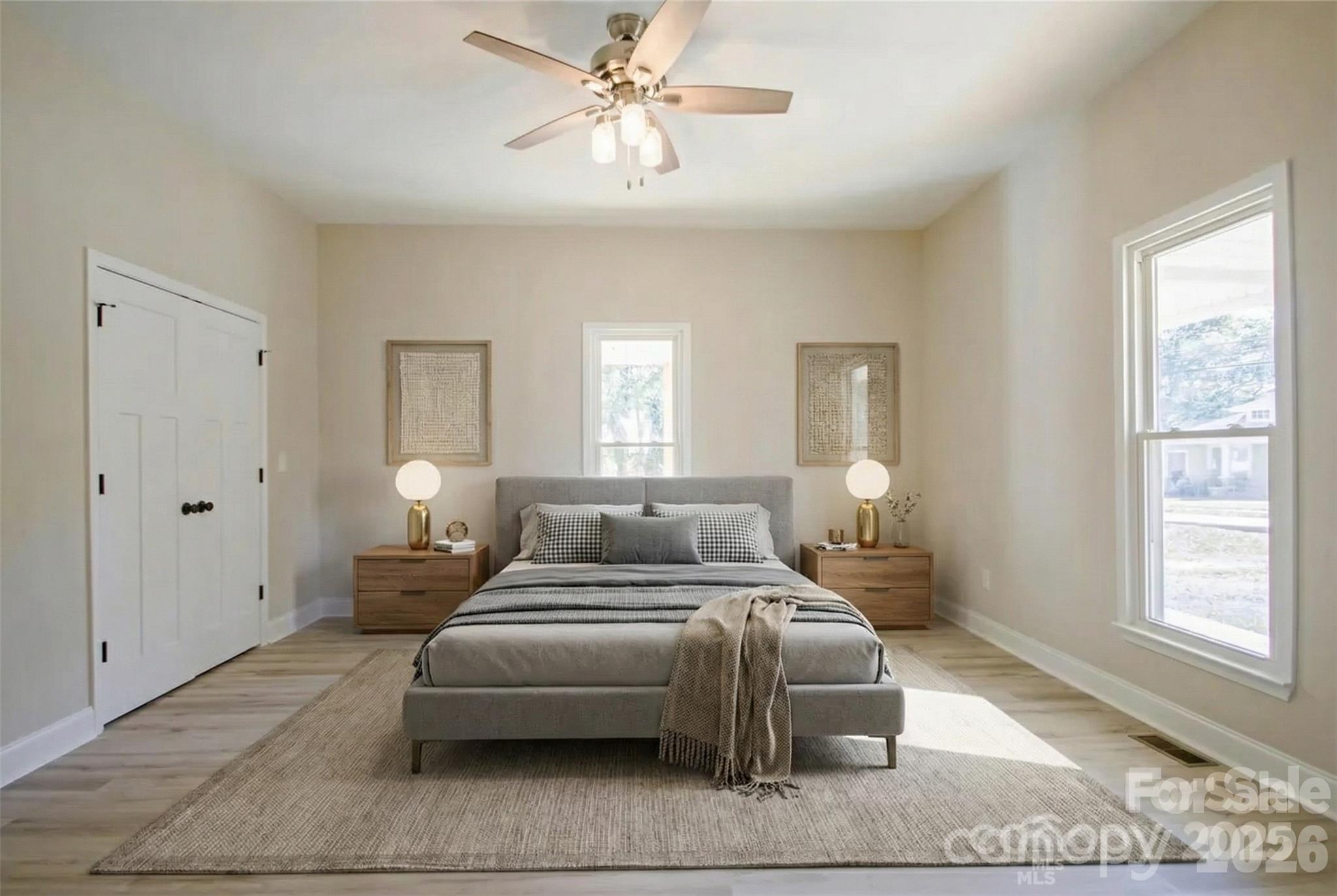 119 Marion Street Clover, SC 29710 - Photo 20 of 46 a bedroom with a bed couch and window