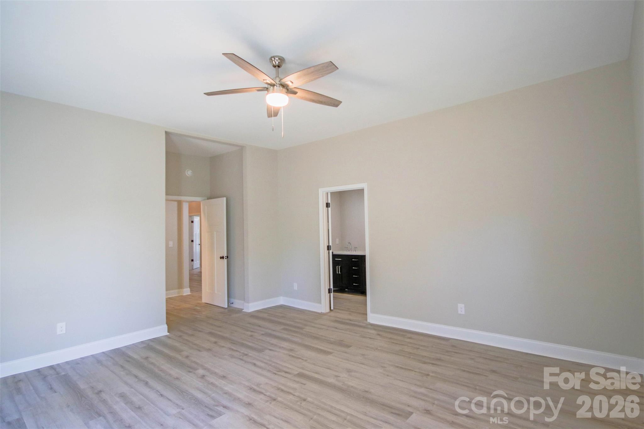 119 Marion Street Clover, SC 29710 - Photo 40 of 46 a view of an empty room with wooden floor and a window