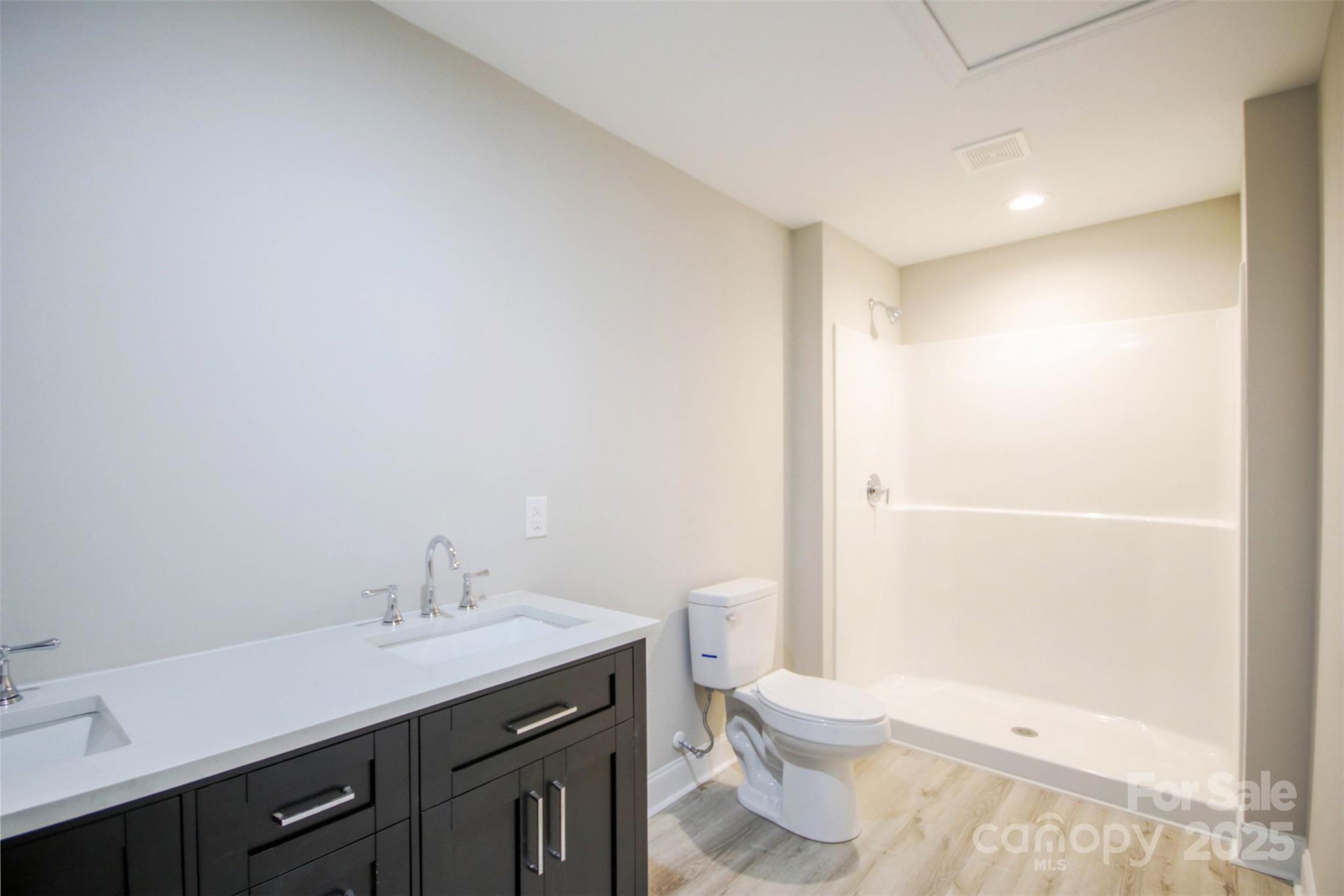 119 Marion Street Clover, SC 29710 - Photo 41 of 45 a bathroom with a sink a toilet and shower