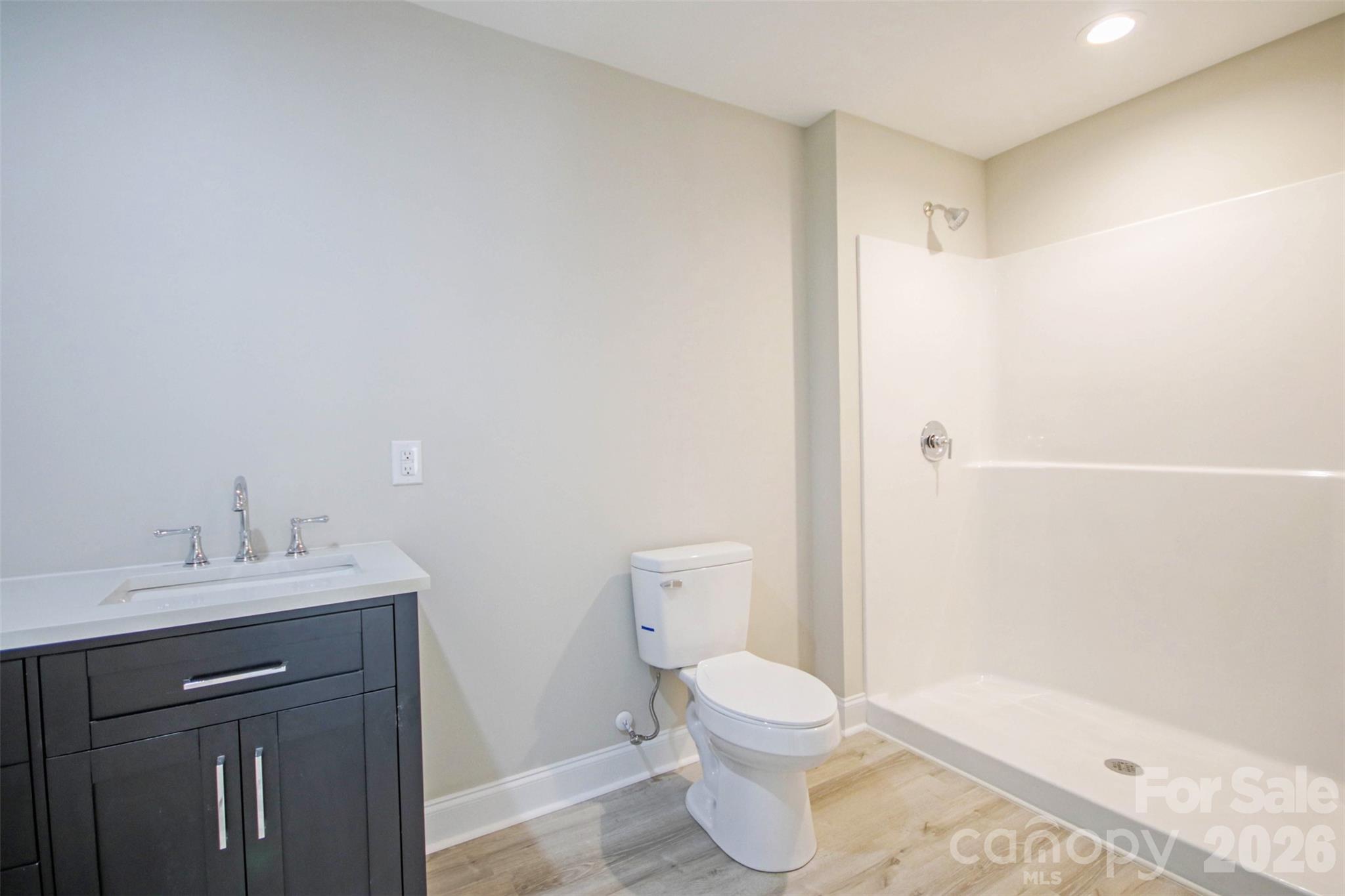 119 Marion Street Clover, SC 29710 - Photo 42 of 46 a bathroom with a sink a toilet and shower