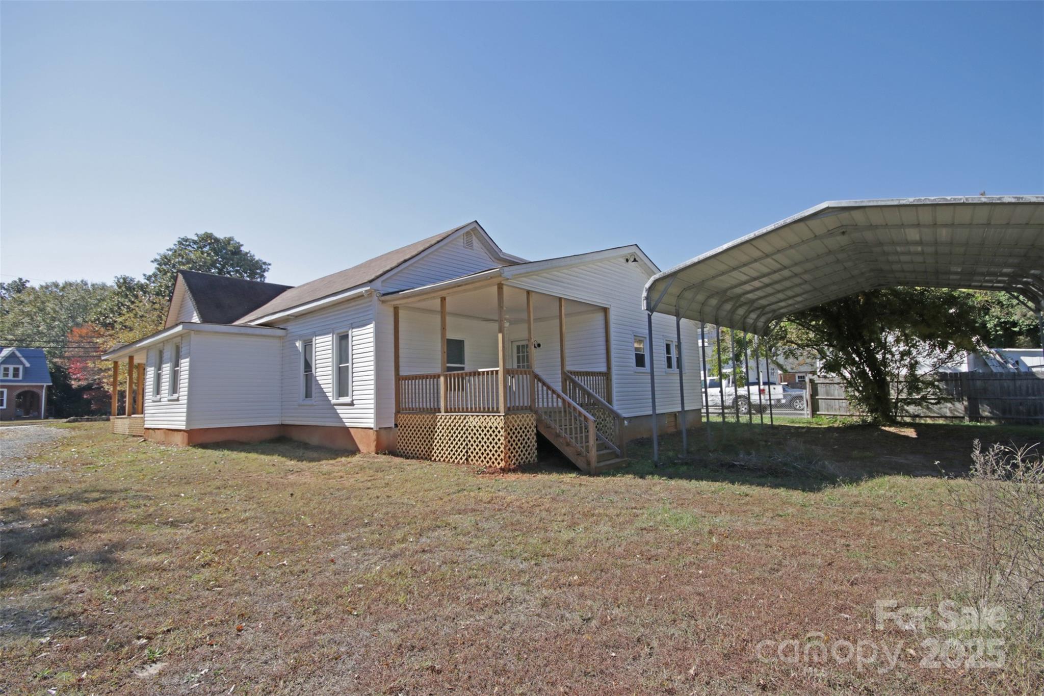 119 Marion Street Clover, SC 29710 - Photo 9 of 45 front view of a house with a yard