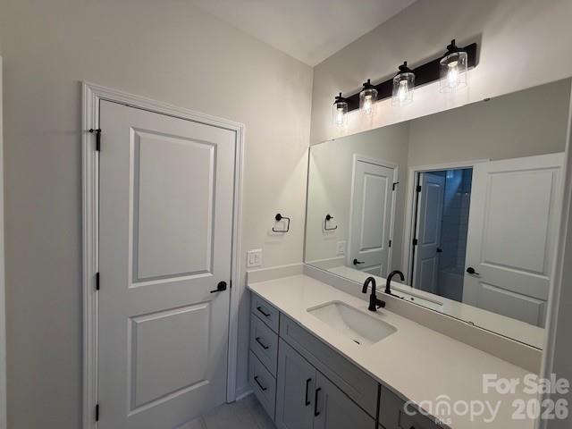 307 Sowers Ferry Road Spencer, NC 28144 - Photo 9 of 13 a bathroom with a double vanity sink mirror and