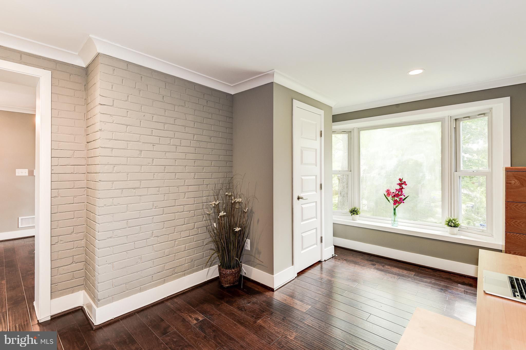 8805 Bradford Road Silver Spring, MD 20901 - Photo 14 of 27 Bonus room! Natural light! Large bay window bench.
