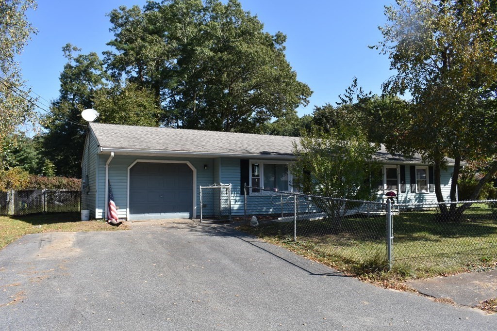 a view of a house with outdoor space and porch