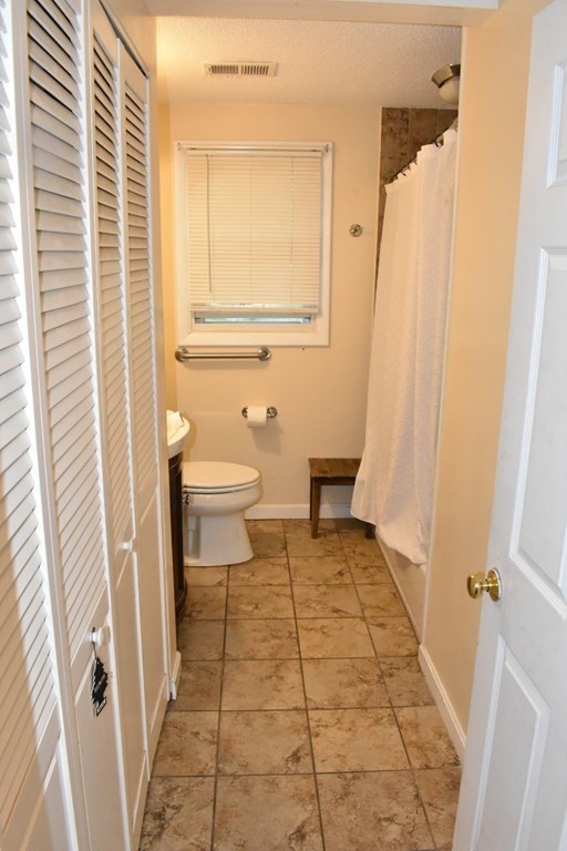 15 Rainbow Circle Middleboro, MA 02346 - Photo 14 of 22 a bathroom with a sink a toilet and a shower