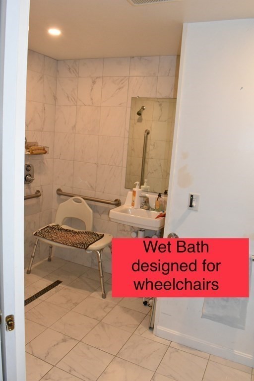 15 Rainbow Circle Middleboro, MA 02346 - Photo 18 of 22 a bathroom with a granite countertop sink and a mirror