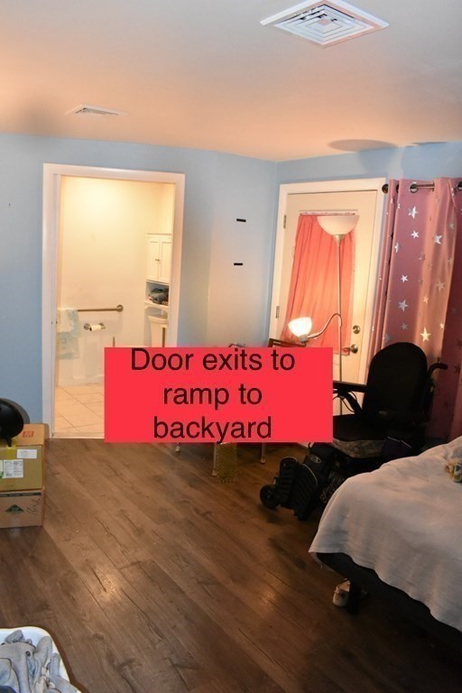 15 Rainbow Circle Middleboro, MA 02346 - Photo 19 of 22 a bed room with a bed and a yard