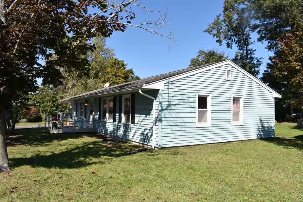 15 Rainbow Circle Middleboro, MA 02346 - Photo 6 of 22 a front view of a house with a yard