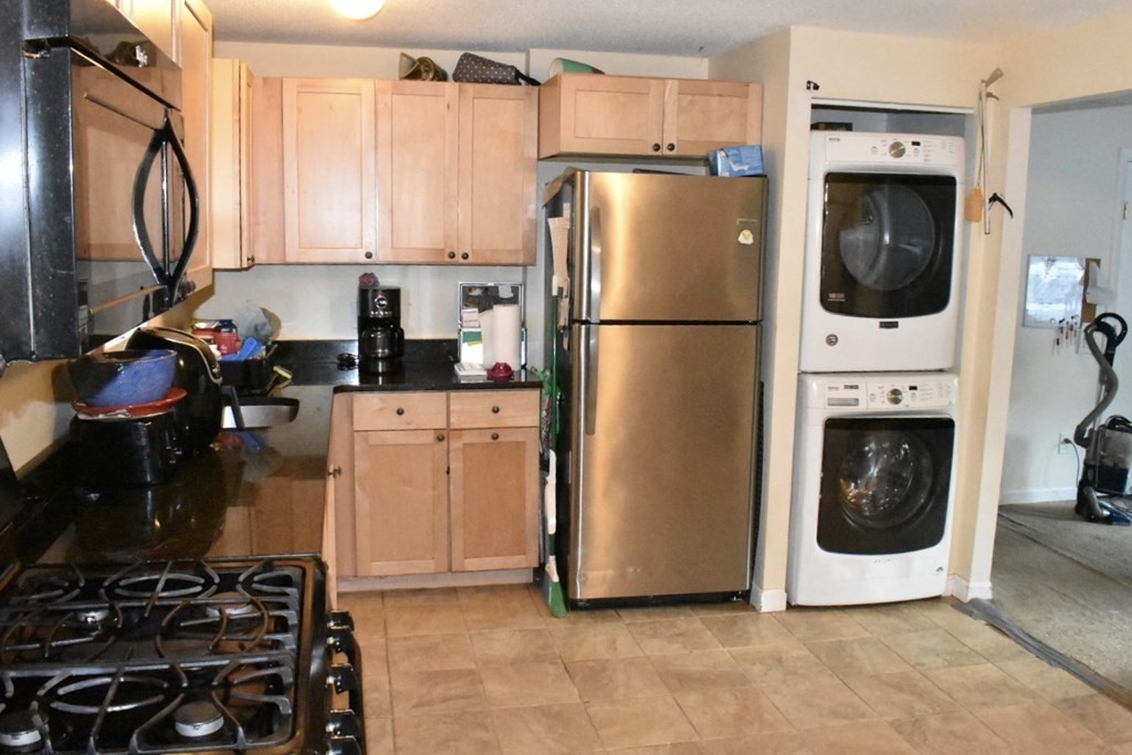 15 Rainbow Circle Middleboro, MA 02346 - Photo 10 of 22 a kitchen with stainless steel appliances a refrigerator stove and sink