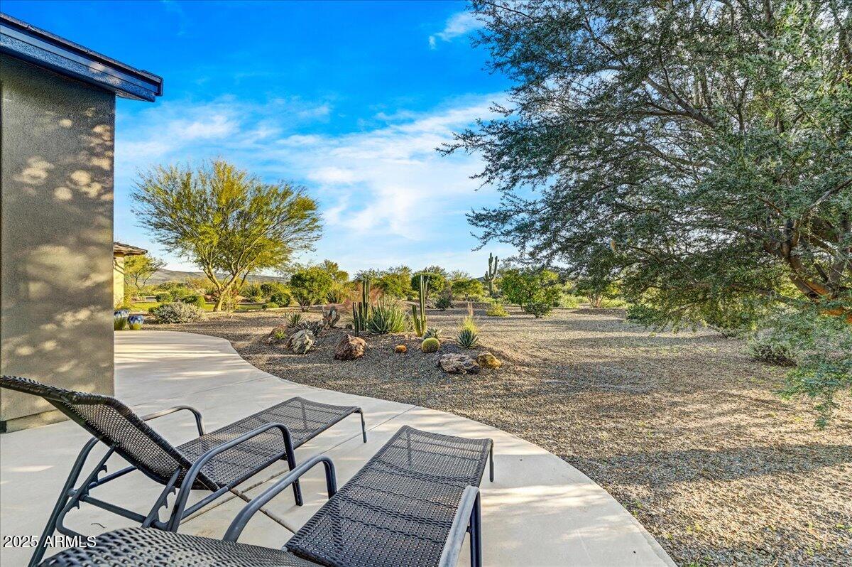 17919 East Slide Rock Drive Rio Verde, AZ 85263 - Photo 23 of 48 a view of a backyard tables and chairs