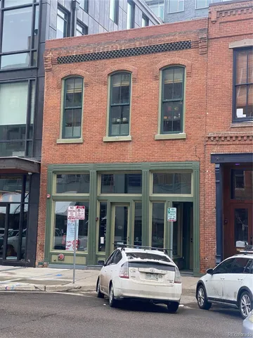 a car parked in front of a building