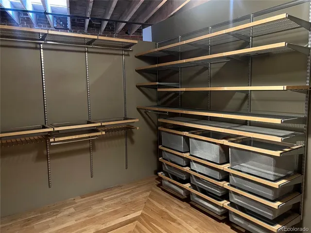 a view of room with racks on the wall