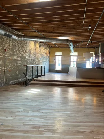 a view of a room with glass windows