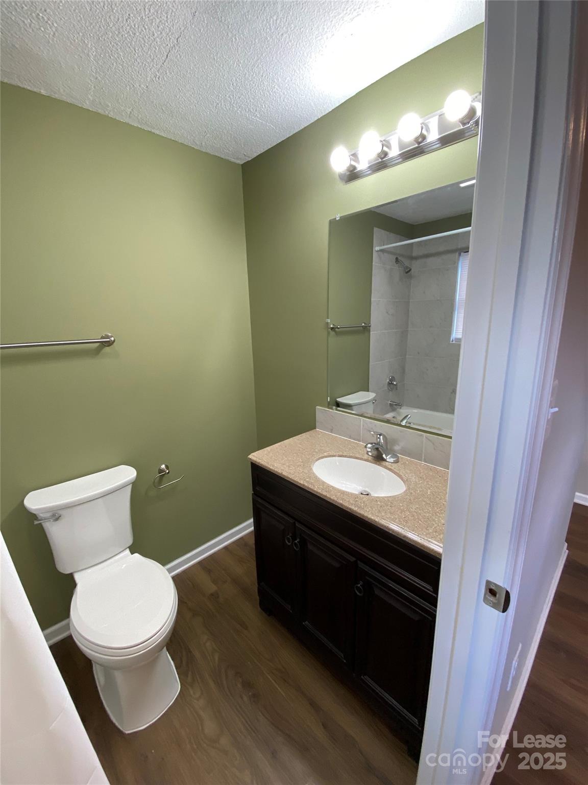 1625 Armstrong Ford Road, Unit B Belmont, NC 28012 - Photo 5 of 5 a bathroom with a sink and a mirror