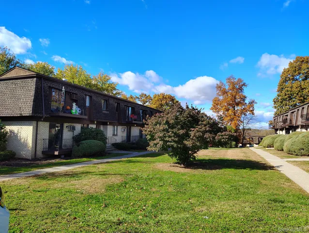 a house view with a garden space