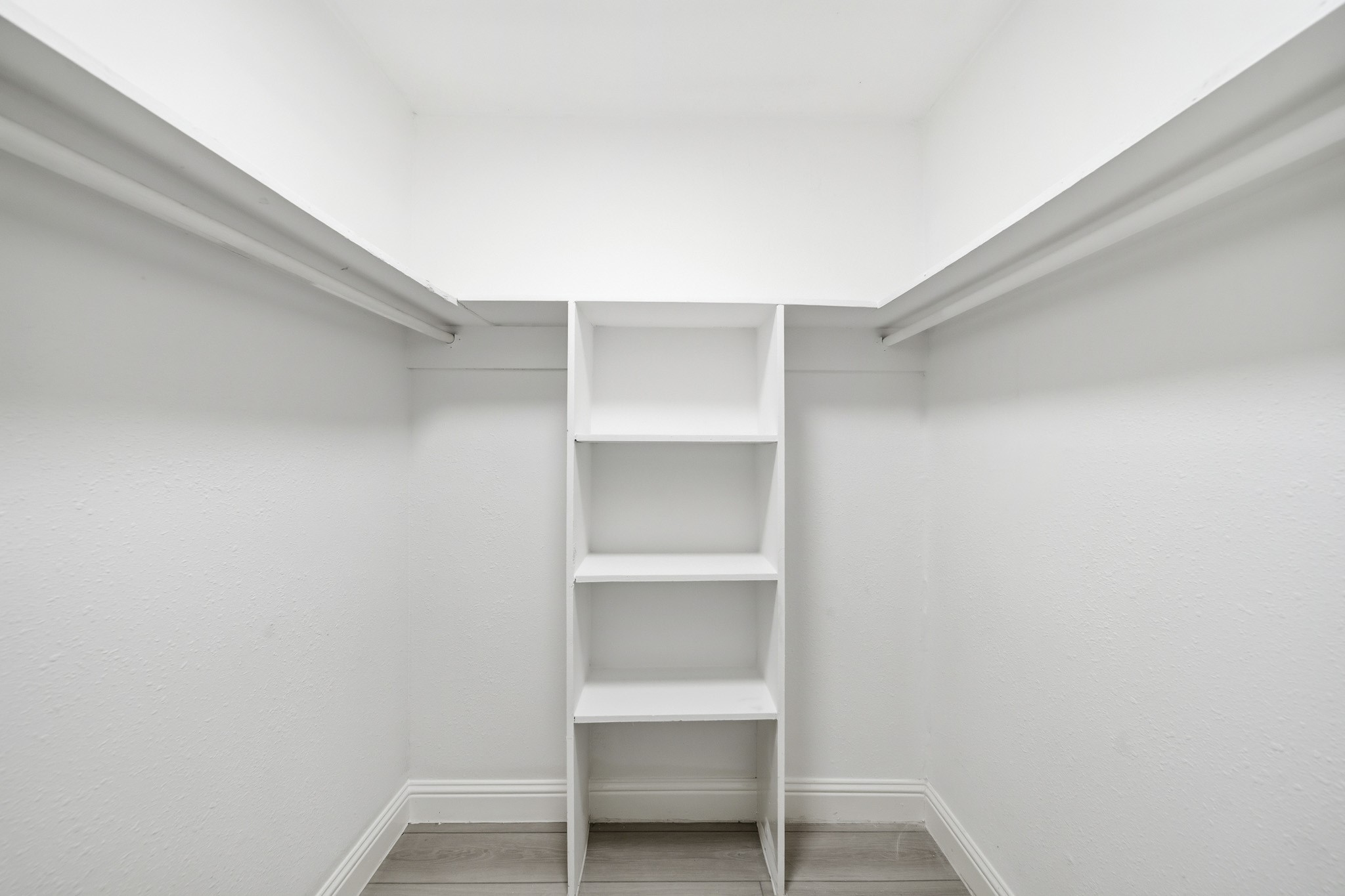 5347 Castlecreek Lane Houston, TX 77053 - Photo 17 of 20 a view of an empty walk in closet