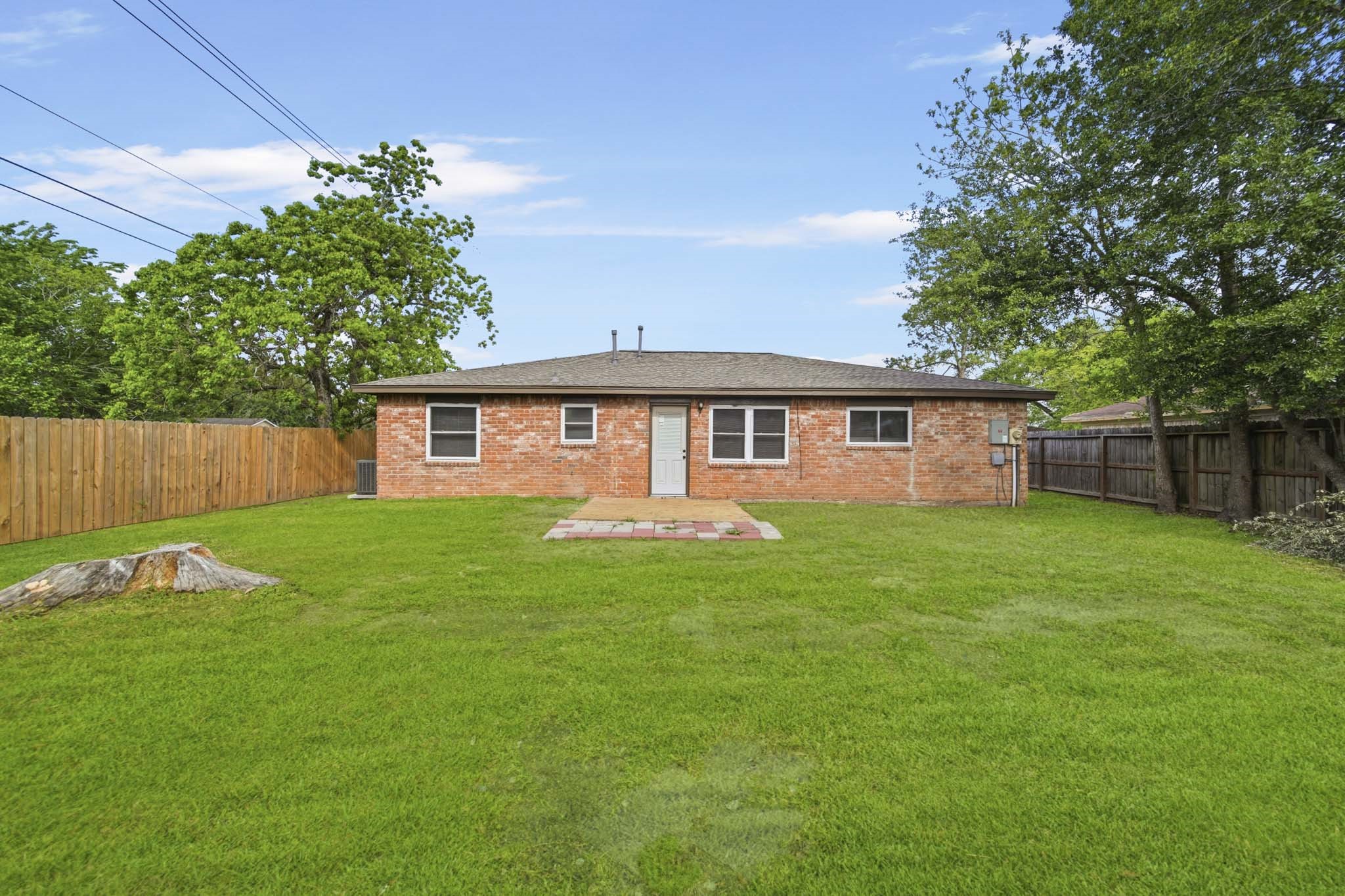 5347 Castlecreek Lane Houston, TX 77053 - Photo 19 of 20 a view of a house with a backyard