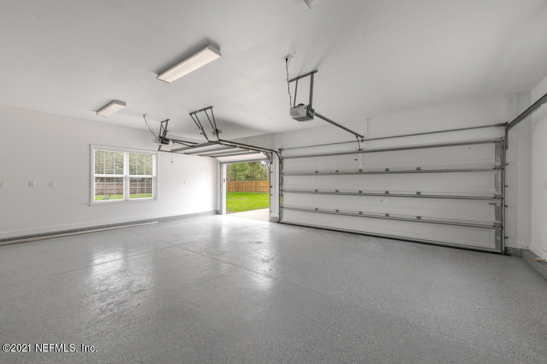 97002 Po Folks Way Yulee, FL 32097 - Photo 23 of 57 a view of a room with empty racks