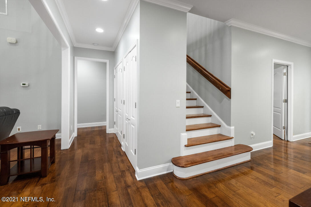 97002 Po Folks Way Yulee, FL 32097 - Photo 25 of 57 a view of a room with wooden floor and stairs