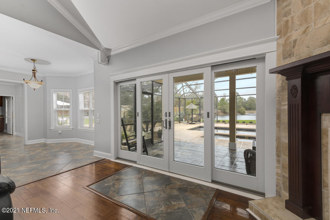 97002 Po Folks Way Yulee, FL 32097 - Photo 39 of 57 a view of a big room with windows
