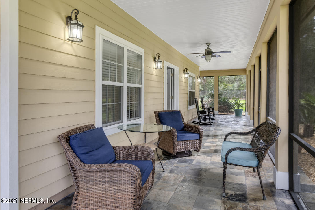 97002 Po Folks Way Yulee, FL 32097 - Photo 40 of 57 a living room with furniture and a window