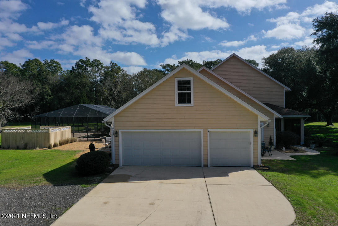97002 Po Folks Way Yulee, FL 32097 - Photo 4 of 57 a view of a back yard of the house