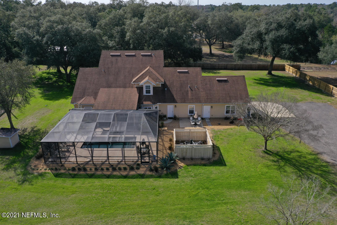 97002 Po Folks Way Yulee, FL 32097 - Photo 5 of 57 an aerial view of a house with a garden