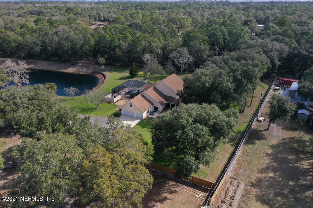 97002 Po Folks Way Yulee, FL 32097 - Photo 54 of 57 an aerial view of a house with a yard