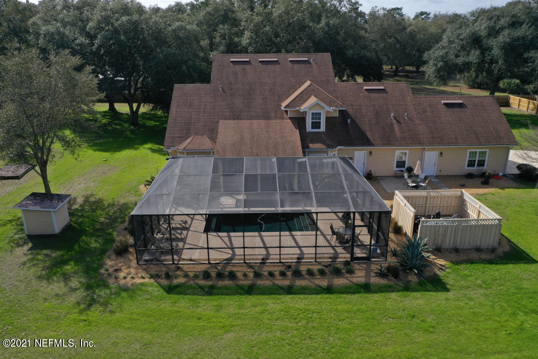 97002 Po Folks Way Yulee, FL 32097 - Photo 6 of 57 a aerial view of a house with a garden