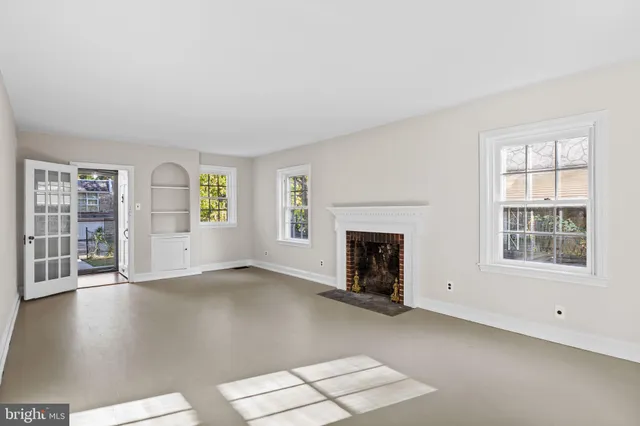 an empty room with windows